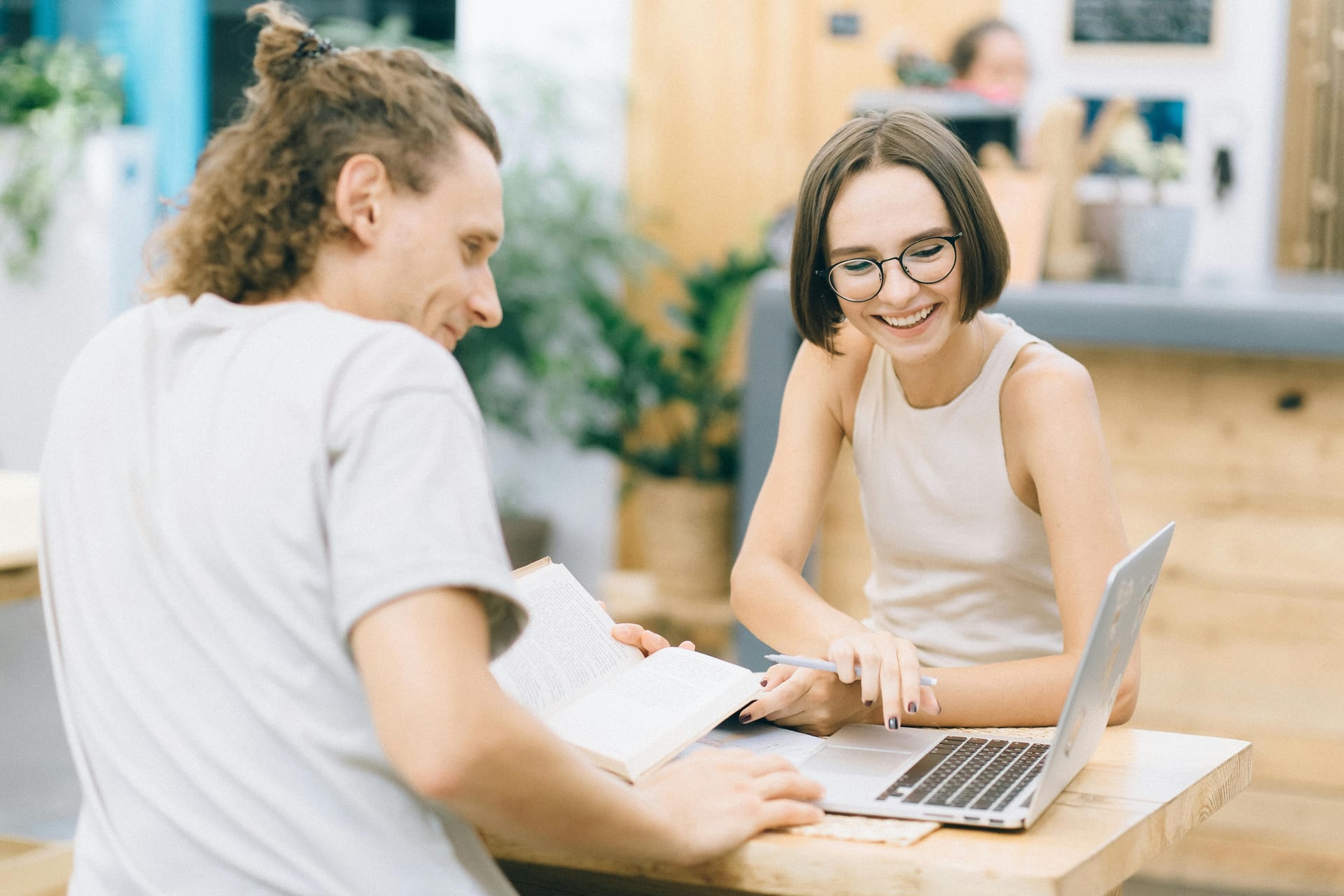 Two people in a friendly one-on-one meeting