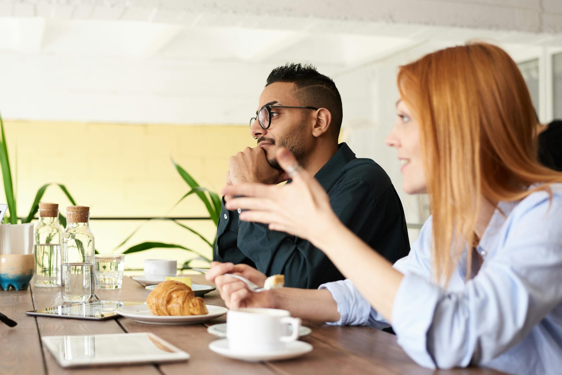 Two people in a focused professional discussion